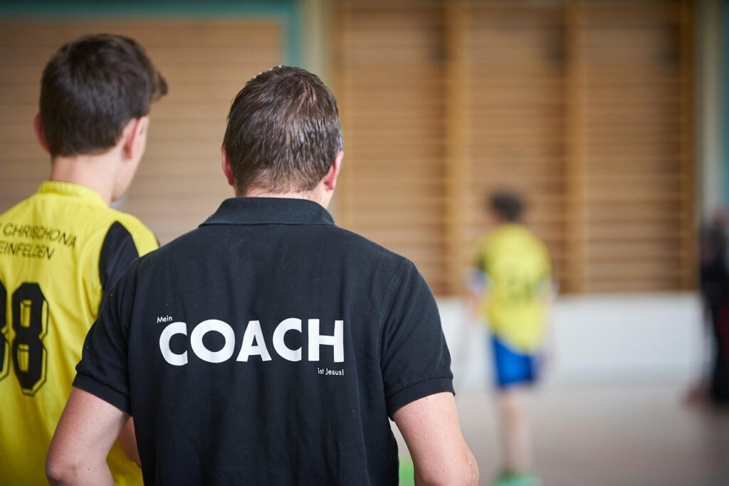 Mentor coaching a younger professional